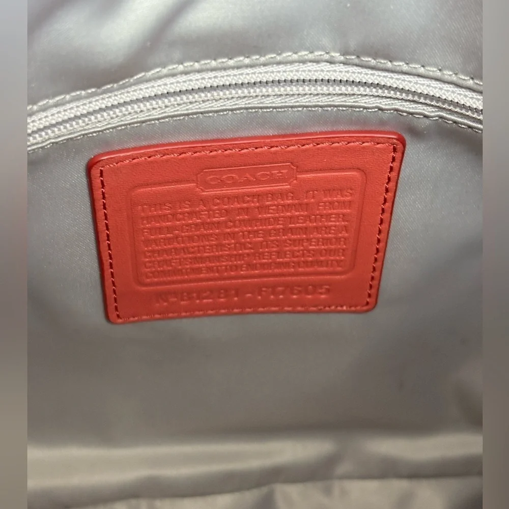 COACH women’s Coral salmon genuine leather crossbody purse NWOT silver hardware